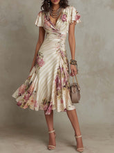 Printed V-neck Defined Waistline Ruffled Hem Dress