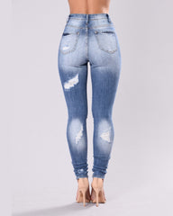 Ripped Elastic Skinny Jeans