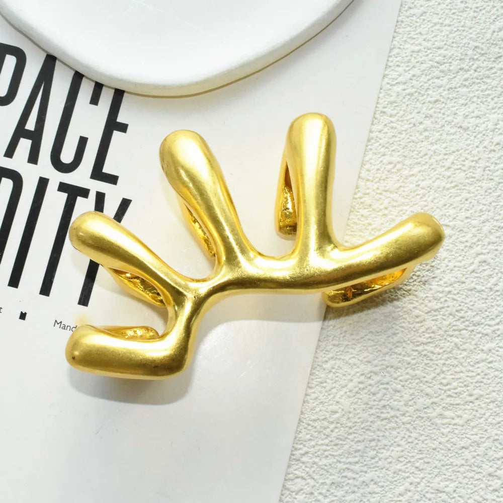 Manuel Sculptural Hand Armor Ring