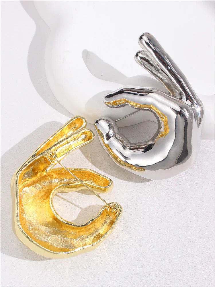 Metal Pinching Hand Brooches
