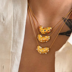 Golden Heart Zircon and Pearl Pendant Necklaces