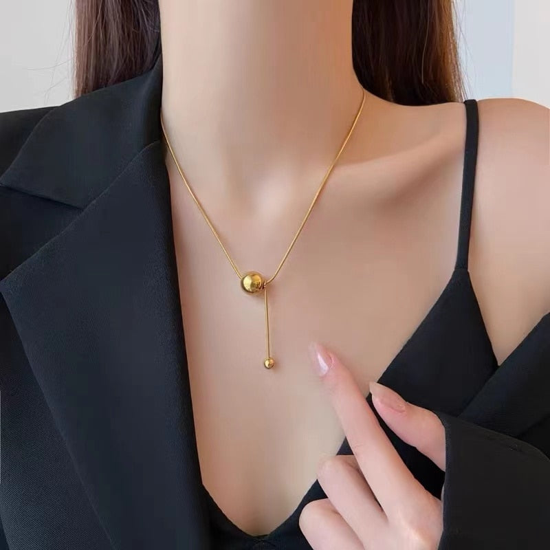 Wella Linked Gold Spheres Necklace