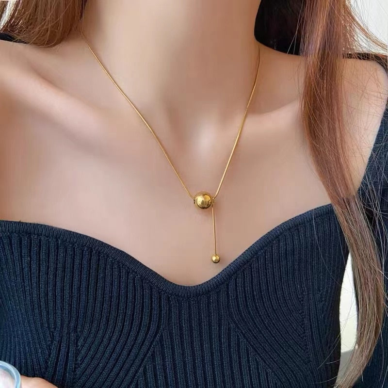 Wella Linked Gold Spheres Necklace