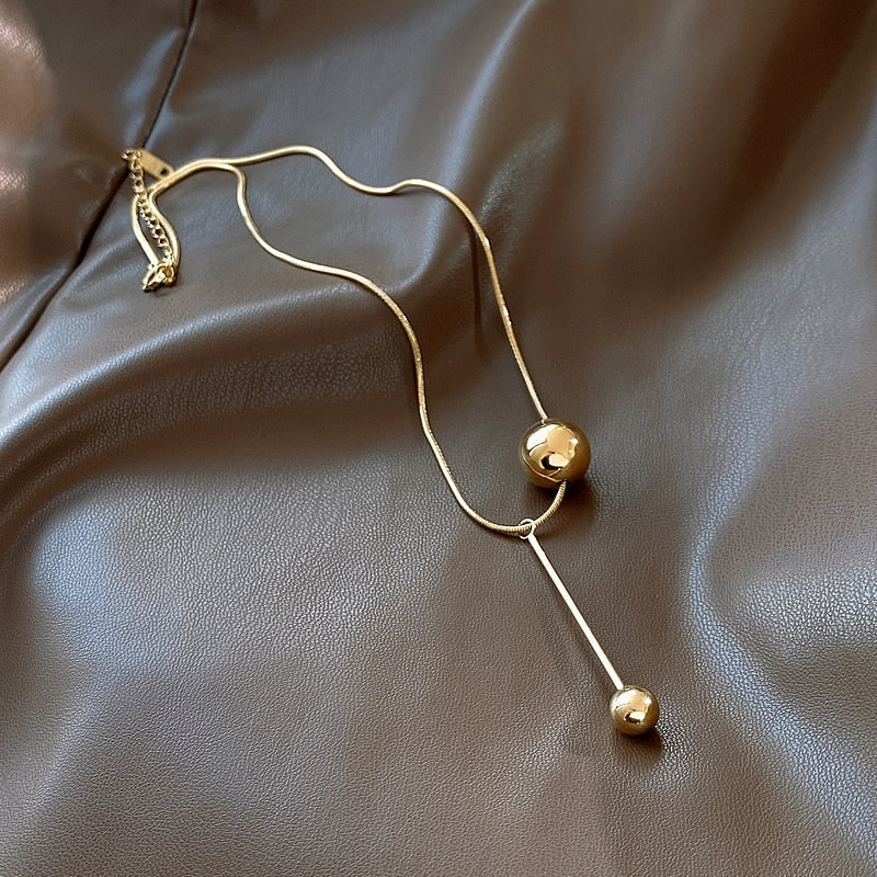 Wella Linked Gold Spheres Necklace