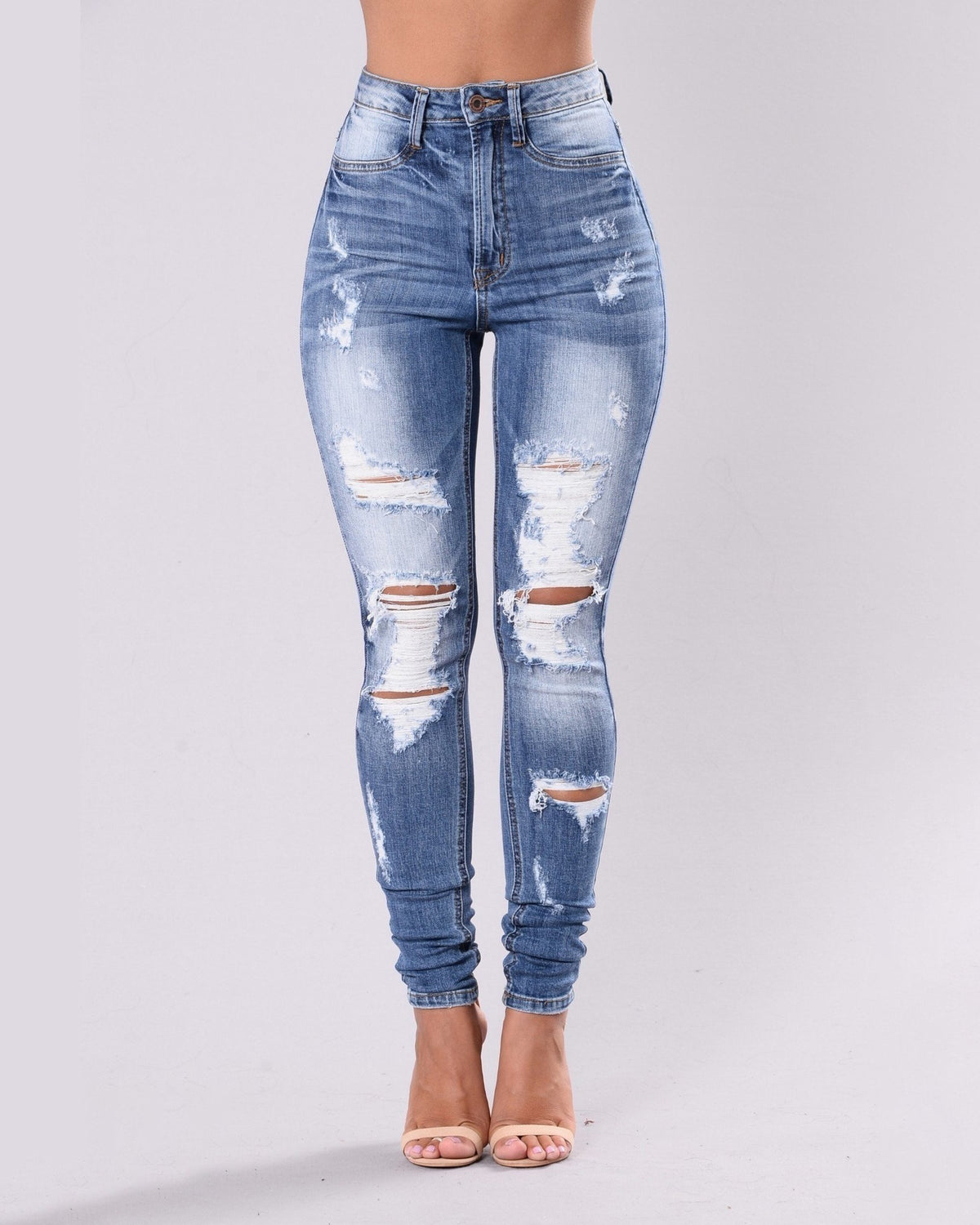 Ripped Elastic Skinny Jeans